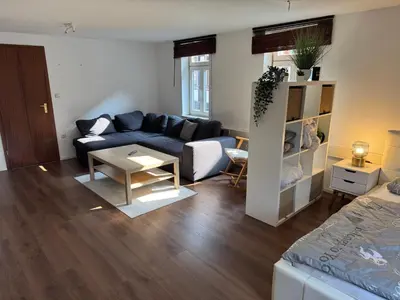 Ein Sitzbereich in der Unterkunft Unterkunft im Zentrum der Stadt