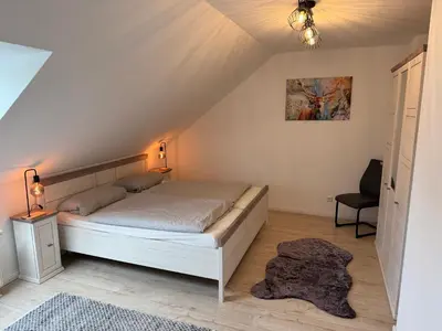 Ein Bett oder Betten in einem Zimmer der Unterkunft Ferienwohnung Bergzauber Braunlage