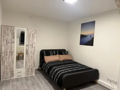 Ein Bett oder Betten in einem Zimmer der Unterkunft Guestroom K17