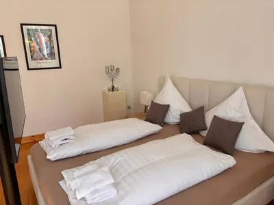 Ein Bett oder Betten in einem Zimmer der Unterkunft Villa Einhorn - Altstadt Studio - stilvoll besonders