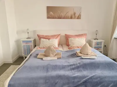 Ein Bett oder Betten in einem Zimmer der Unterkunft Ferienwohnung Rieger 3