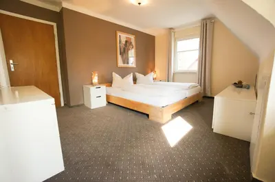 Ein Bett oder Betten in einem Zimmer der Unterkunft Ferienhaus Blocksberg