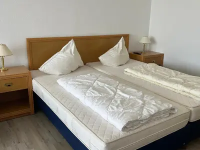 Ein Bett oder Betten in einem Zimmer der Unterkunft Haus Vier Jahreszeiten am See Die Stille