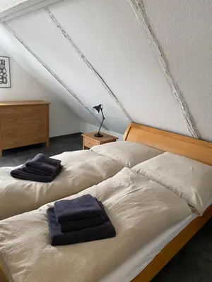 Ein Bett oder Betten in einem Zimmer der Unterkunft Ferienwohnung Hof Bernsee