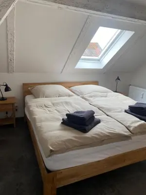 Ein Bett oder Betten in einem Zimmer der Unterkunft Ferienwohnung Hof Bernsee