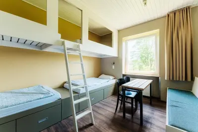 Ein Bett oder Betten in einem Zimmer der Unterkunft Haus Waldläufer
