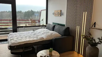 Ein Bett oder Betten in einem Zimmer der Unterkunft Ferienwohnung Panoramablick Hahnenklee
