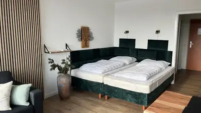 Ein Bett oder Betten in einem Zimmer der Unterkunft Ferienwohnung Panoramablick Hahnenklee