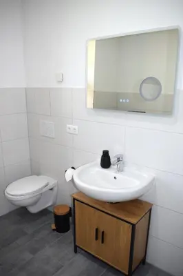 Ein Badezimmer in der Unterkunft Harz Huus Apartment 
