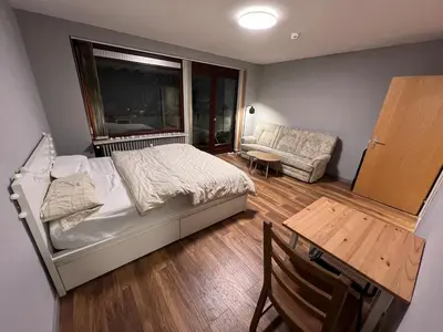 Ein Bett oder Betten in einem Zimmer der Unterkunft Renovated apartment with Wi-Fi