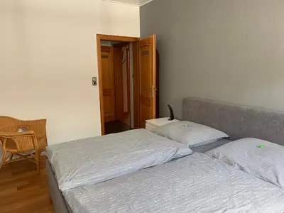 Ein Bett oder Betten in einem Zimmer der Unterkunft Ferienwohnung in der Altstadt mit eigenem Parkplatz