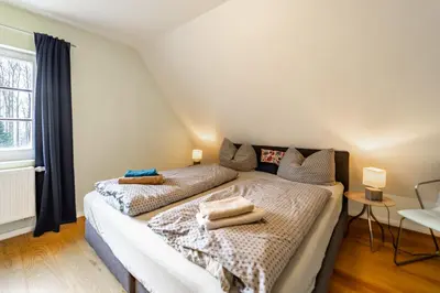 Ein Bett oder Betten in einem Zimmer der Unterkunft Forsthaus Wohnung 2 4 Pers Kamin & Balkon