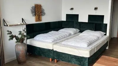 Ein Bett oder Betten in einem Zimmer der Unterkunft Ferienwohnung Panoramablick Hahnenklee