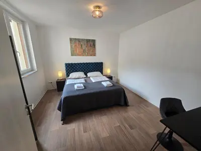 Ein Bett oder Betten in einem Zimmer der Unterkunft Sonnenblick Suite 1