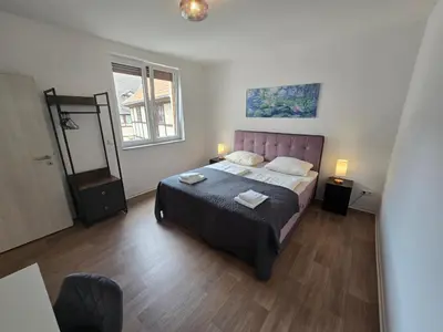 Ein Bett oder Betten in einem Zimmer der Unterkunft Sonnenblick Suite 2