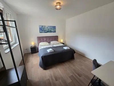 Ein Bett oder Betten in einem Zimmer der Unterkunft Sonnenblick Suite 2