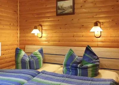 Ein Bett oder Betten in einem Zimmer der Unterkunft Ferienhaus Petra