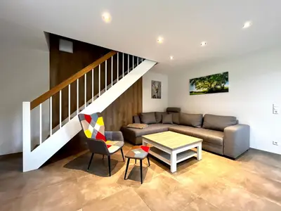 Ein Sitzbereich in der Unterkunft Ferienhaus Harzlicht Bettwäsche Handtücher inkl