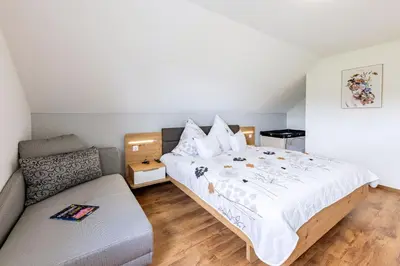 Ein Bett oder Betten in einem Zimmer der Unterkunft Ferienhaus Sammy
