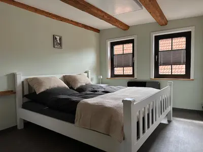 Ein Bett oder Betten in einem Zimmer der Unterkunft Ferienhaus 