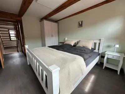 Ein Bett oder Betten in einem Zimmer der Unterkunft Ferienhaus 
