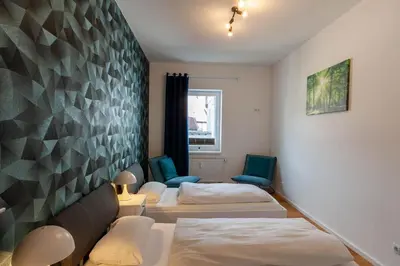 Ein Bett oder Betten in einem Zimmer der Unterkunft Ferienwohnung Herzog 1 mit Terrasse