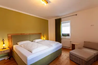 Ein Bett oder Betten in einem Zimmer der Unterkunft Ferienwohnung Herzog 1 mit Terrasse