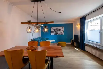 Ein Sitzbereich in der Unterkunft Ferienwohnung Am Bach 1 mit Terrasse
