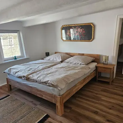 Ein Bett oder Betten in einem Zimmer der Unterkunft Alte Wäscherei