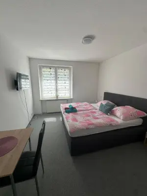Ein Bett oder Betten in einem Zimmer der Unterkunft Pension Syrtaki