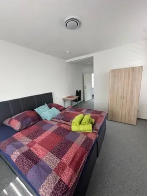Ein Bett oder Betten in einem Zimmer der Unterkunft Pension Syrtaki