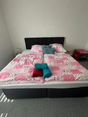 Ein Bett oder Betten in einem Zimmer der Unterkunft Pension Syrtaki