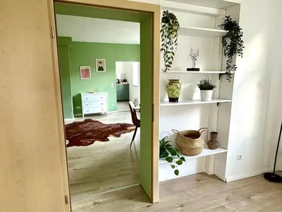 Ein Bett oder Betten in einem Zimmer der Unterkunft Familien Apartment inkl Spielecke nähe Pullman City Westernstadt
