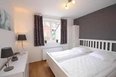 Ein Bett oder Betten in einem Zimmer der Unterkunft Ferienwohnung Wurmbergzeit mit Terrasse