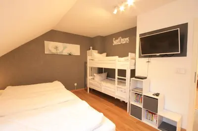 Ein Bett oder Betten in einem Zimmer der Unterkunft Ferienwohnung Wurmbergherz