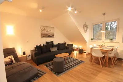 Ein Sitzbereich in der Unterkunft Ferienwohnung Wurmbergherz