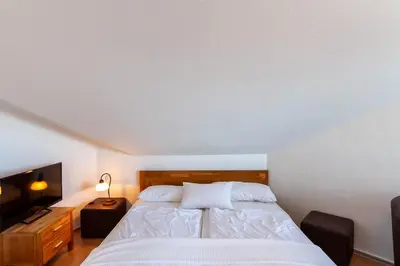 Ein Bett oder Betten in einem Zimmer der Unterkunft Apartment Kleine Elfe am Hasselkopflift
