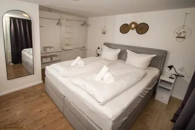 Ein Bett oder Betten in einem Zimmer der Unterkunft THEFIVE60 Apartments