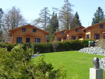Ein Garten an der Unterkunft Harz-Blockhaus, Berg -