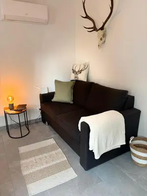 Ein Sitzbereich in der Unterkunft Tiny House Am Goldbach