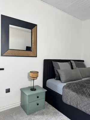 Ein Bett oder Betten in einem Zimmer der Unterkunft Ferienwohnung Grüne Auszeit Braunlage