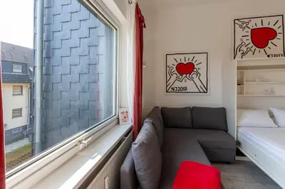 Ein Bett oder Betten in einem Zimmer der Unterkunft Schützenchalet Junior Suite mit Sauna und Grill