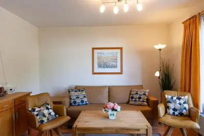 Ein Sitzbereich in der Unterkunft Ferienwohnung Harzer Glück mit Balkon und Sauna