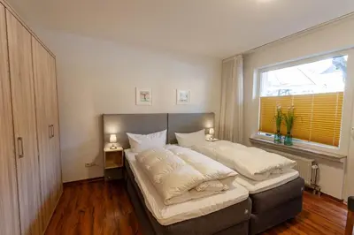 Ein Bett oder Betten in einem Zimmer der Unterkunft Ferienwohnung Bergrast mit Balkon