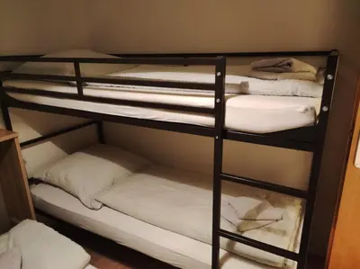 Ein Bett oder Betten in einem Zimmer der Unterkunft Urlaubshaus-Braunlage Wohnung 2