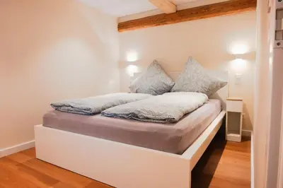 Ein Bett oder Betten in einem Zimmer der Unterkunft Ilsehof Apartment Anna