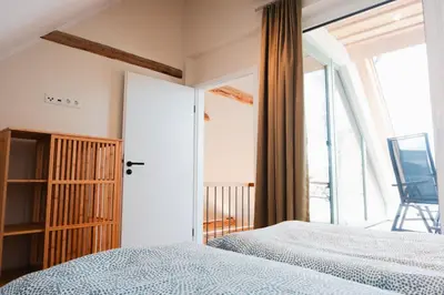 Ein Bett oder Betten in einem Zimmer der Unterkunft Ilsehof Apartment Anna