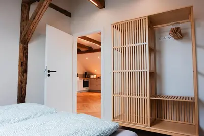 Ein Bett oder Betten in einem Zimmer der Unterkunft Ilsehof Apartment Berta