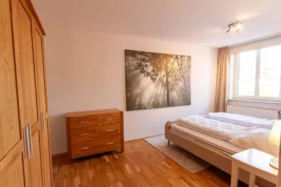 Ein Bett oder Betten in einem Zimmer der Unterkunft Ferienwohnung Bergwiesenblick mit Balkon