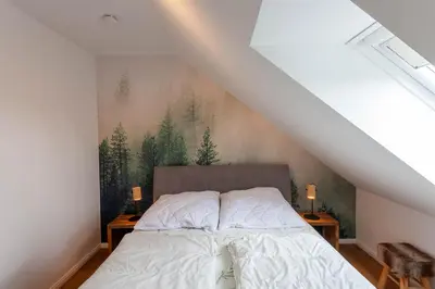 Ein Bett oder Betten in einem Zimmer der Unterkunft Ferienwohnung Kleine Fichte mit Balkon